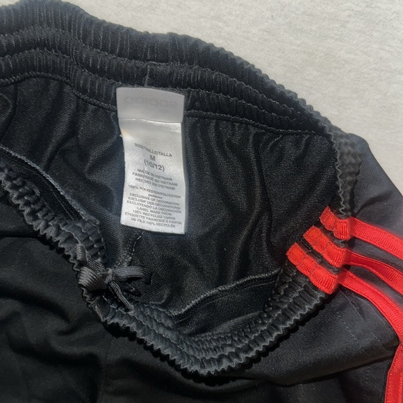 Kids Size Medihill Adidas Black and Red Joggers with Sporty Stripes. - Picture 2 of 3
